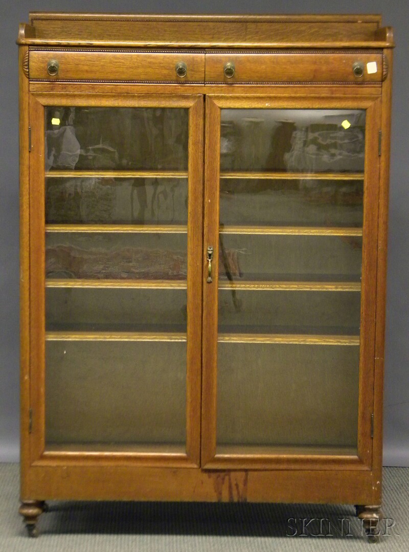 Affordable Antique Furnishings | 20th Century Carved Oak Two-door Book Cabinet,