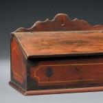 Red-painted Decorated Slant-Lid Wall Box, reportedly came from Pennsylvania, 19th century (Lot 1042, Estimate $400-$600)