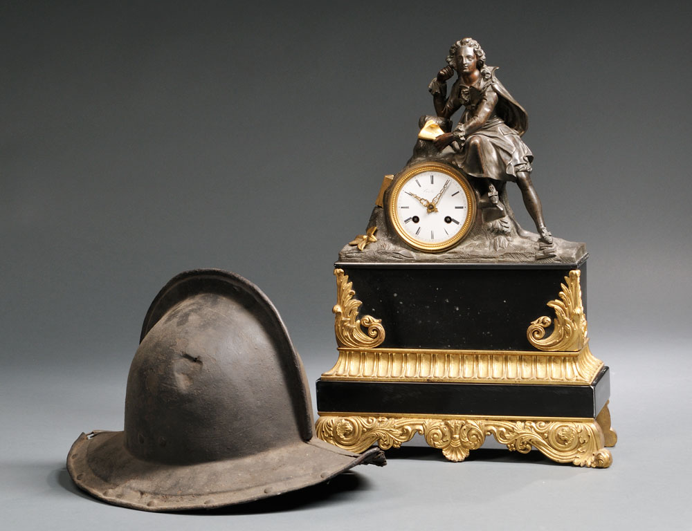 French Black Slate and Gilt Mantel Clock, mid to late 19th century (Lot 1338, Estimate $200-$300) and Continental Morion Helmet, c. 17th century (Lot 1074, Estimate $400-$600) French Black Slate and Gilt Mantel Clock, mid to late 19th century (Lot 1338, Estimate $200-$300) and Continental Morion Helmet, c. 17th century (Lot 1074, Estimate $400-$600)
