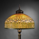 Tiffany Studios Curtain Border Floor Lamp, Mosaic art glass, bronze, New York, c. 1908 (Lot 139, Estimate $30,000-$50,000)