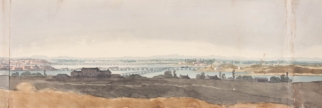 Panel 4. In the foreground and to the left of center, is the prison. Running off to the right and connecting with Craigie’s Bridge, is Prison Point Bridge. On the opposite bank at the right is Leechmore Point, Cambridge. The courthouse and jail are probably indicated in the buildings a this point.