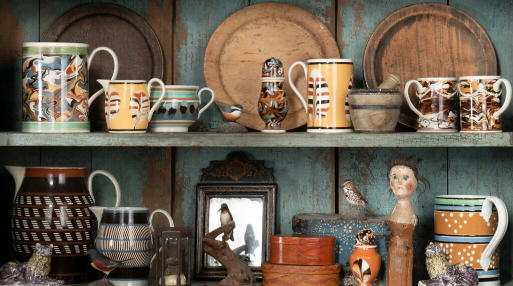 Small American antiques on a shelf